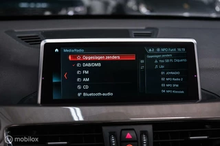 BMW X1 BMW X1 xDrive20i High Executive | 4x4 | HUD | Trekhaak | Leder | Orig NL auto | Dealer onderhouden | Camera | rijklaarprijs | - afbeelding nr 23