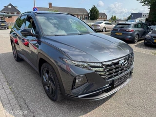 Hyundai Tucson Hyundai Tucson 1.6 T MHEV BlackLine 4WD Automaat , Trekhaak 1.650kg Trekgewicht ,  Panorama Dak , Stoel & Stuur verwarming ,  Navigatie & Camera , Parkeerhulp voor & achter, Keyless entry , Electr Achter klep , IQ telefoonlader - afbeelding nr 7