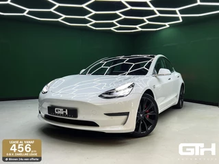 Tesla Model 3 - 527431775-0