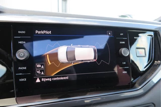 Volkswagen Polo Pano dak,Led, Adaptive cruise , Navigatie via Carplay, Buitenspiegels inklapbaar, etc. prijs rijklaar. - afbeelding nr 40