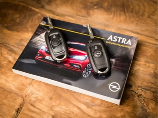Opel Astra Opel Astra Sports Tourer 1.0 Sportline (APPLE CARPLAY, NAVIGATIE, GETINT GLAS, CHROOM PAKKET, XENON, SPORTSTOELEN, BLUETOOTH, CRUISE CONTROL, NIEUWSTAAT) - afbeelding nr 13