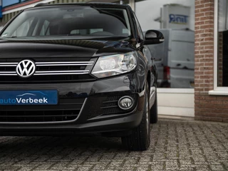 Volkswagen Tiguan Volkswagen Tiguan 1.4TSi DSG6 Cup Sport&Style | Trekhaak 1.800kg. | 2e eigenaar | Climate Control | Stoelverwarming | Parkeer pakket | Winter-pakket | Koplampsproeiers | Multifunctioneel lederen stuurwiel - afbeelding nr 23
