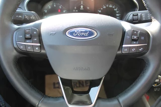 Ford Focus Ford Focus Wagon 1.0-125pk EcoBoost Mild-hybrid Titanium. Mooie, ruime, luxe en comfortabele Ford Focus wagon. Volautm. airco dual, camera, stoel-, stuur- en voorraamverw., easy entry/easy go, cruise control, Isofix, side- en lane assist, parkeersensoren v+a, LM wielen etc. - afbeelding nr 14