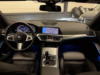 BMW 3 Serie BMW 3 Serie Touring 330e M-Sport DRAVITGRAU PANO/LASER/HEAD-UP/ADAPTIVE M-ONDERSTEL/KEYLESS/19