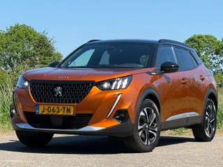 Peugeot 2008 Peugeot 2008 1.2 PureTech GT-Line 130pk Automaat - Orange Fusion - Chique - afbeelding nr 2