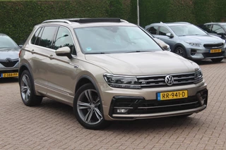 Volkswagen Tiguan Volkswagen Tiguan 1.4 TSI ACT Highline Bus. R-Line / Trekhaak / Panoramadak / 360Camera / 19'' / Virtual Cockpit / Apple CarPlay / DAB / Stoelverwarming / ACC - afbeelding nr 1