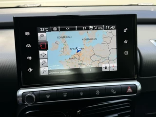 Citroën C4 Cactus Citroen C4 Cactus 1.2 PureTech Shine 110pk Navigatiesysteem | Climate control | Cruise control | Multifunctioneel stuurwiel | Trekhaak | Isofix | Getint glas | Inparkeerhulp | Parkeersensoren voor en achter | Achteruitrijcamera - afbeelding nr 11