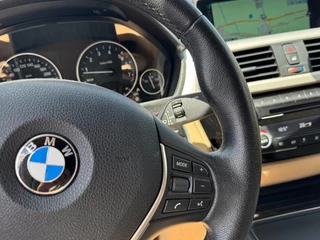 BMW 3 Serie BMW 3-serie 320i High Executive 184 PK / PDC / NAVIGATIE / CRUISE / NL AUTO / LEDER / AUTOMAAT - afbeelding nr 17