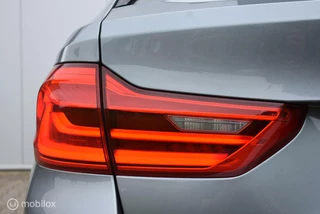 BMW 5 Serie BMW 520i Touring M-Sport Bluestone Pano Comfortstoel 360°Camera HUD Leder HiFi Adaptive LED 19