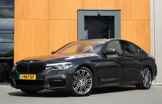 BMW 5 Serie BMW 5-serie 520i High Executive M-Sport | Schuifdak | H&K | Trekhaak - afbeelding nr 1