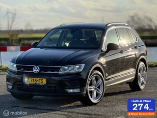 Volkswagen Tiguan - 306542089-0