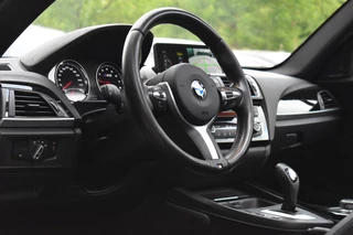 BMW 1 Serie BMW 1-serie M140i xDrive High Executive Pano Camera H/K Leder Elekstoel - afbeelding nr 9