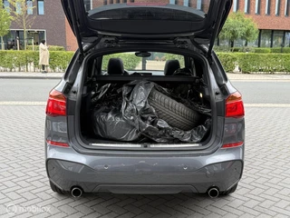 BMW X1 BMW X1 xDrive20i M Sport Panodak Navi HUD Harman Trekhaak Camera - afbeelding nr 26