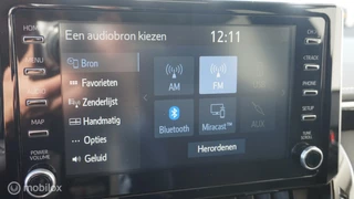 Toyota Corolla Toyota Corolla 1.8 Hybrid Navigatie | Adapt. Cruise Contr | Schuif-kanteldak | PDC V+A - afbeelding nr 18