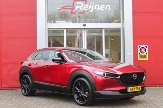 Mazda CX-30 Mazda CX-30 2.0 e-SkyActiv-G M Hybrid 150PK AUTOMAAT NAGISA Mazda CX-30 2.0 e-SkyActiv-G M Hybrid 150PK AUTOMAAT  NAGISA | ELEKTRISCH VERSTELBARE VOORSTOELEN | BESTUURDERSSTOEL MET GEHEUGENFUNCTIE | STOELVERWARMING | BOSE AUDIO SYSTEM | FULL LED KOPLAMPEN | HEAD UP DISPLAY GEKOPPELD AAN STOELGEHEUGEN | CLIMATE CONTROL | DRAADLOOS APPLE CARPLAY/ANDROID AUTO | NAVIGATIE | DODEHOEK DETECTIE | ELEKTRISCHE BEDIENBARE ACHTERKLEP | DRAADLOZE TELEFOON LADER | ADAPTIVE CRUISE CONTROL | KEYLESS ENTRY/START | SPORT PAKKET | - afbeelding nr 12