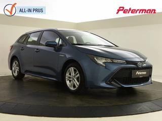 Toyota Corolla Touring Sports 1.8 Hybrid Active | Trekhaak | Adapt. cruise | Carplay/Androida.