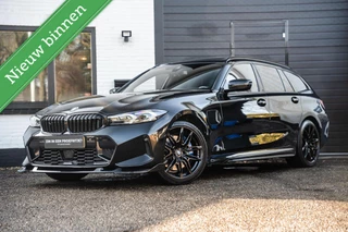 BMW 3 Serie Touring 330e M Zetels Pano H&K HU Trekhaak