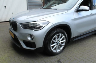 BMW X1 BMW X1 sDrive18i 141pk AUTOMAAT NL-Auto 74.942km Clima Cruise Navi Camera HUD Keyless El. Klep 17