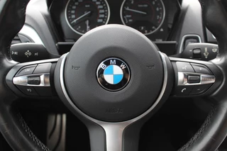 BMW 1 Serie BMW 1 Serie 118i High Exe. M Sport / Schuifdak / Camera / Leder / 18'' / Navigatie / Sportstoelen / Stoelverwarming / DAB / Cruise Control - afbeelding nr 20