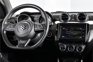 Suzuki Swift | Adapt. Cruise |Stoelverw. | Camera | NAV + App. Connect | ECC | Afn. Trekhaak | LM 16
