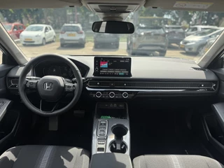 Honda Civic Honda Civic 2.0 e:HEV Elegance € 1850 KORTING! Dodehoek detectie, verwarmde stoelen , All-in Rijklaarprijs - afbeelding nr 17