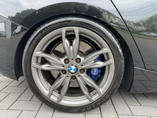 BMW 1 Serie BMW 1-serie M135i Executive RWD Schuifdak Xenon Leer Carplay - afbeelding nr 42