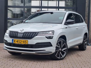 Škoda Karoq | LED | Virtual | Trekhaak | Stoel- & stuurverwarming | Navi | App-connect | - afbeelding nr 1