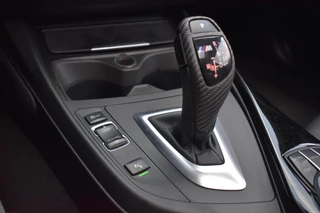 BMW 1 Serie BMW 1-serie M140i xDrive High Executive Pano Camera H/K Leder Elekstoel - afbeelding nr 27