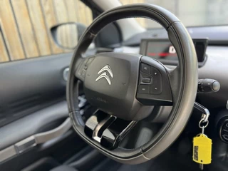Citroën C4 Cactus Citroen C4 Cactus 1.2 PureTech Shine 110pk Navigatiesysteem | Climate control | Cruise control | Multifunctioneel stuurwiel | Trekhaak | Isofix | Getint glas | Inparkeerhulp | Parkeersensoren voor en achter | Achteruitrijcamera - afbeelding nr 49