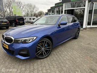 BMW 3 Serie BMW 3-serie Touring 330e High Executive M-SPORT - afbeelding nr 1