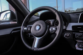BMW X1 ➡️ BMW X1 sDrive18i F48 Executive | 2e eigenaar | Trekhaak | Sportstuur | DAB | Navi | PDC | Cruise-control | Climate | 140 pk | Automaat | 17 inch | Bluetooth | - afbeelding nr 21