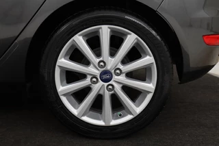 Ford Fiesta Ford Fiesta 1.0 EcoBoost Titanium | Camera | Trekhaak |  Climate control | Navigatie | Cruise control | Verwarmde voorruit | PDC | Regensensor - afbeelding nr 24