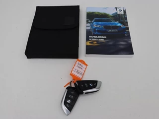 BMW 1 Serie BMW 1-serie 118i M Sport | Trekhaak | Carplay | Navigatie |  Sportstoelen | Half leder | Full LED | Climate control | Parkeerhulp - afbeelding nr 12