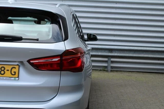 BMW X1 BMW X1 sDrive18i 141pk AUTOMAAT NL-Auto 74.942km Clima Cruise Navi Camera HUD Keyless El. Klep 17