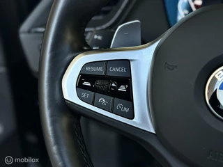 BMW 1 Serie BMW 1-serie M135i xDrive |Pano |HUD |H&K |Sfeer |Stuurverw. - afbeelding nr 25