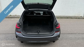 BMW 3 Serie BMW 330i Touring High Executive | M Pakket | Shadowline | H&R | Standkachel | Display Key - afbeelding nr 10