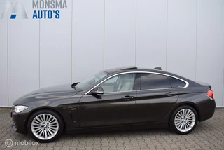 BMW 4 Serie BMW 420i Gran Coupé Luxury Jatoba Schuifdak HUD 360° Camera HiFi Keyless M-Stuurwiel Zeer mooi! - afbeelding nr 1