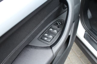 BMW X1 BMW X1 sDrive18i 136pk Centennial Executive AUTOMAAT NL-Auto NAP Clima Cruise Navi PDC 17