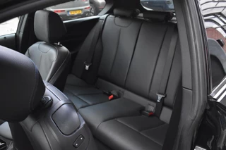 BMW 1 Serie BMW 1-serie M140i xDrive High Executive Pano Camera H/K Leder Elekstoel - afbeelding nr 49