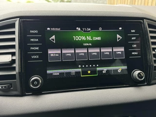 Škoda Karoq Skoda Karoq 1.5 TSI Sportline Automaat | Panoramadak | LED | Stoelverwarming | Adaptieve cruise control | Dode hoek detectie | Trekhaak uitklapbaar | Canton HiFi | Elektrisch bedienbare achterklep | Parkeersensoren voor en achter | Achteruitrijcamera - afbeelding nr 18