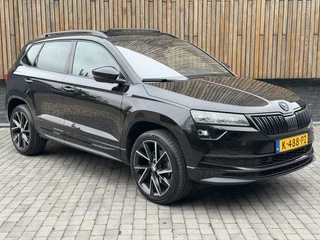 Škoda Karoq Skoda Karoq 1.5 TSI Sportline Automaat | Panoramadak | LED | Stoelverwarming | Adaptieve cruise control | Dode hoek detectie | Trekhaak uitklapbaar | Canton HiFi | Elektrisch bedienbare achterklep | Parkeersensoren voor en achter | Achteruitrijcamera - afbeelding nr 43