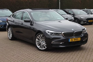 BMW 6 Serie BMW 6 Serie Gran Turismo 630i High Exe. Edition 68.661 km! / Panoramadak / 360Camera / Head-up / Luchtvering / 20'' / Luxe Leder / Safety Pack / Luxury Line / Navigatie / Stoelverwarming - afbeelding nr 1