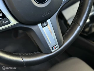BMW 1 Serie BMW 1-serie M135i xDrive |Pano |HUD |H&K |Sfeer |Stuurverw. - afbeelding nr 24