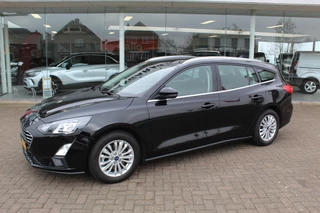Ford Focus Ford Focus Wagon 1.0-125pk EcoBoost Mild-hybrid Titanium. Mooie, ruime, luxe en comfortabele Ford Focus wagon ! Volautm. airco dual, camera, stoel-, stuur- en voorraamverw., easy entry/easy go, cruise control, Isofix, side- en lane assist, parkeersensoren v+a, LM wielen etc. - afbeelding nr 2