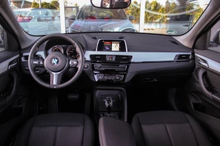 BMW X1 ➡️ BMW X1 sDrive18i F48 Executive | 2e eigenaar | Trekhaak | Sportstuur | DAB | Navi | PDC | Cruise-control | Climate | 140 pk | Automaat | 17 inch | Bluetooth | - afbeelding nr 10