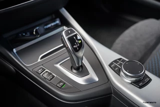 BMW 1 Serie BMW 1-serie M140i LCI2 | Navi Pro | Camera | HK | Stuurverwarming | Alcantara | Adaptief onderstel | 5-deurs - afbeelding nr 25