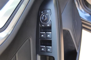 Ford Focus Ford Focus Wagon 1.0-125pk EcoBoost Mild-hybrid Titanium. Mooie, ruime, luxe en comfortabele Ford Focus wagon. Volautm. airco dual, camera, stoel-, stuur- en voorraamverw., easy entry/easy go, cruise control, Isofix, side- en lane assist, parkeersensoren v+a, LM wielen etc. - afbeelding nr 6