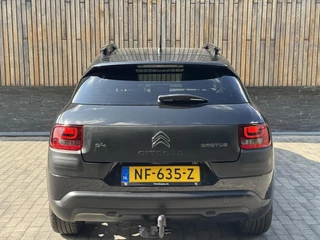 Citroën C4 Cactus Citroen C4 Cactus 1.2 PureTech Shine 110pk Navigatiesysteem | Climate control | Cruise control | Multifunctioneel stuurwiel | Trekhaak | Isofix | Getint glas | Inparkeerhulp | Parkeersensoren voor en achter | Achteruitrijcamera - afbeelding nr 56