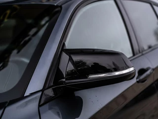 BMW 1 Serie BMW 1-serie M140i xDrive High Executive|H&K|REMUS|19'' - afbeelding nr 17