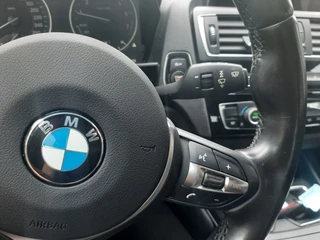 BMW 1 Serie BMW 1 Serie 118i 1.5 136pk Airco Cruise-control Navigatie Bluetooth - afbeelding nr 9